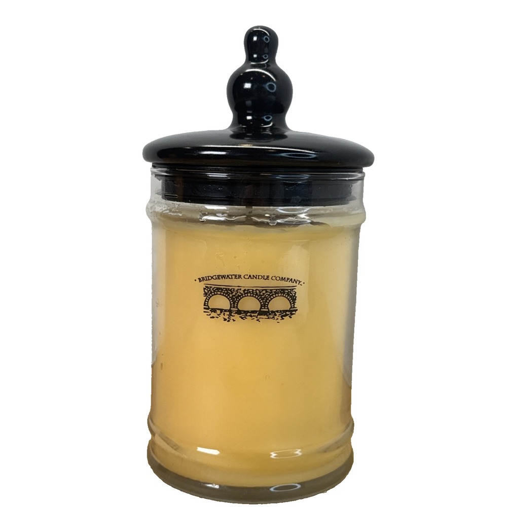 Bridgewater Candle Company Tan Candle In Glass Clear Jar With Black Lid Fruity